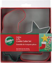 Load image into Gallery viewer, Wilton Jolly Shapes 4 Pieces Christmas Metal Cookie Cutter Set