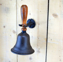 Load image into Gallery viewer, Cast Iron Dinner Hand Bell with Wooden Handle and Wall Storage Bracket